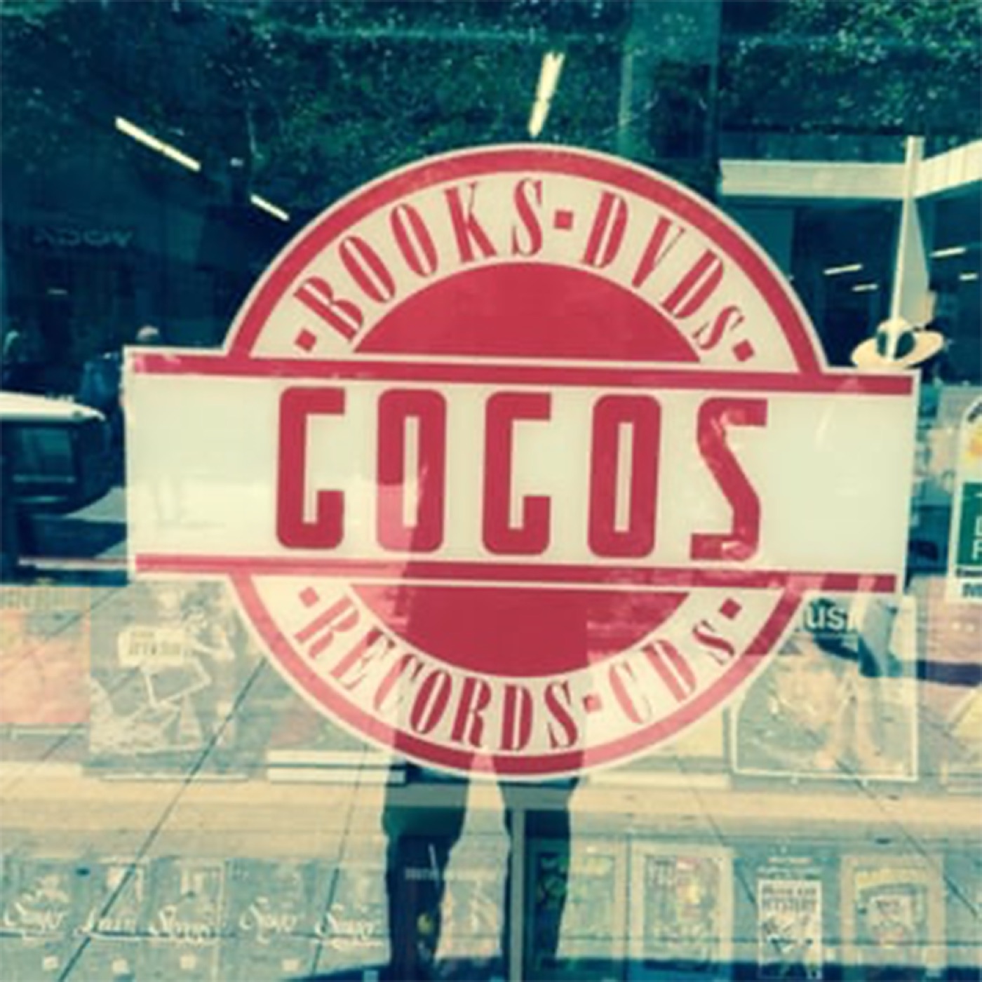 A vintage circular logo reading GOGO'S in red and cream, with the words BOOKS-DIGS and RECORDS-THINGS.