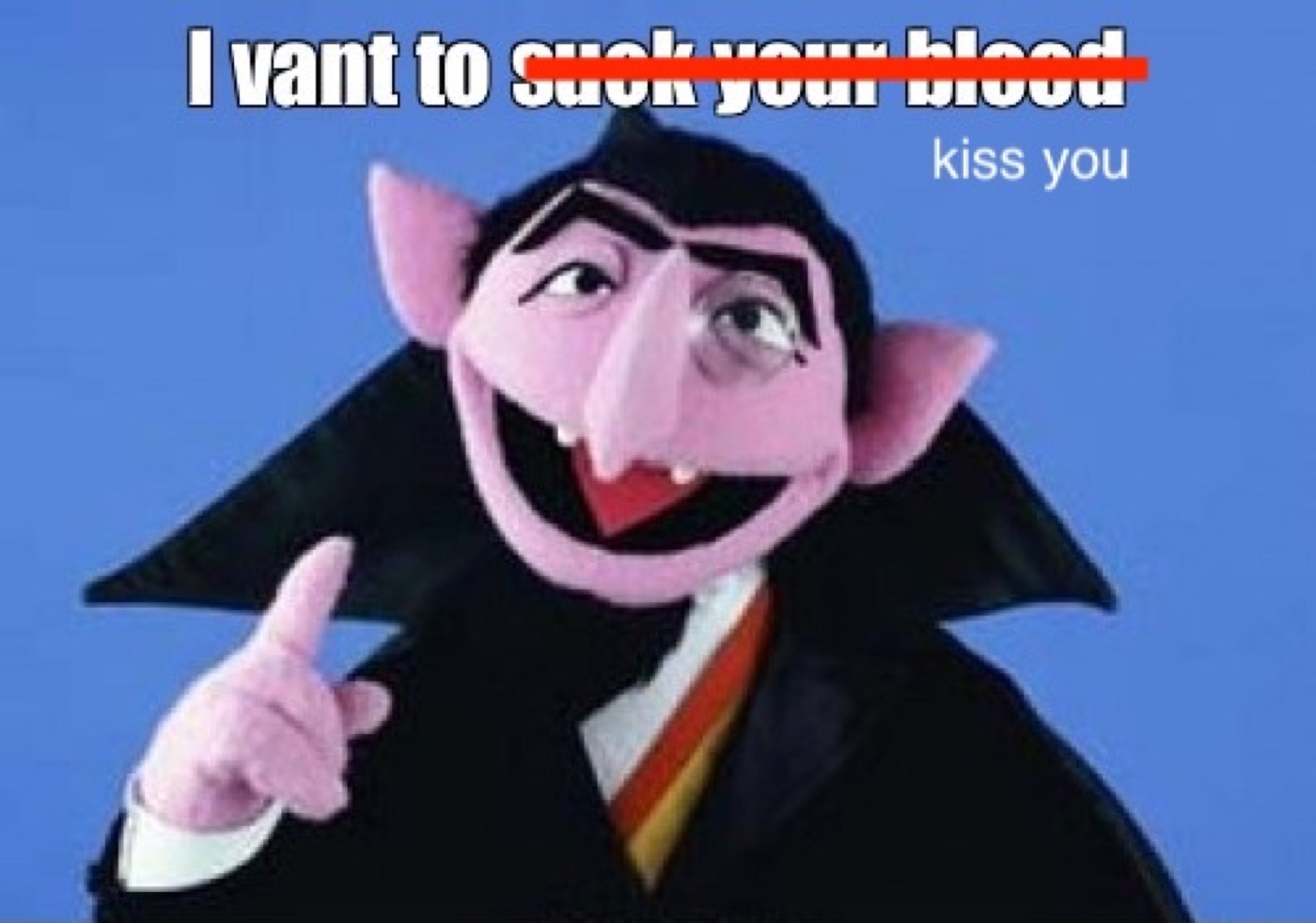 A cartoon vampire with the line I vant to suck your blood struck through and replaced with kiss you.